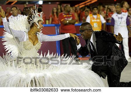 "Couple dancing, flag bearer Porta Bandeira and Mestre Sala, kiss on the hand, parade of the samba school Inocentes de Belford Rocho, Sambodromo, Rio de Janeiro, Brazil, South America" View Large Photo Image Stock Image - "Couple dancing, flag bearer Porta Bandeira and Mestre Sala, kiss on the hand, parade of the samba school Inocentes de Belford Rocho, Sambodromo, Rio de Janeiro, Brazil, South America". Fotosearch