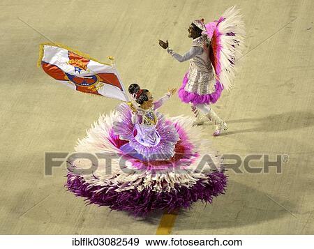 "Couple dancing, Mestre Sala and Porta Bandeira, parade of the samba school Inocentes de Belford Rocho, Sambodromo, Rio de Janeiro, Brazil, South America" View Large Photo Image Stock Photo - "Couple dancing, Mestre Sala and Porta Bandeira, parade of the samba school Inocentes de Belford Rocho, Sambodromo, Rio de Janeiro, Brazil, South America". Fotosearch