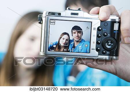"Couple taking pictures of themselves, self-portrait on the display of the camera, Germany, Europe" View Large Photo Image Stock Image - "Couple taking pictures of themselves, self-portrait on the display of the camera, Germany, Europe". Fotosearch