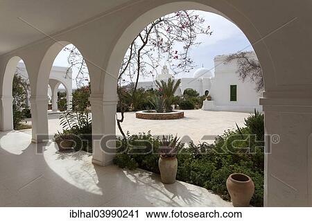 Stock Image - "Courtyard, museum of folk culture, Musee du Patrimonie, Guellala, Djerba, Tunisia, Africa". Fotosearch