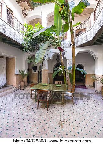 Stock Photo - "Courtyard of a typical Riad, old mansion, Medina, Marrakech, Marrakech-Tensift-El Haouz, Morocco, Africa". Fotosearch