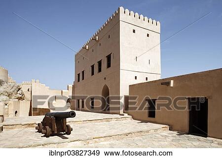 "Courtyard, old cannon, Nakhal Fort or Husn Al Heem, fortress, historic mudbrick building, Al-Batinah province, Sultanate of Oman, Arabian Peninsula" View Large Photo Image Stock Photo - "Courtyard, old cannon, Nakhal Fort or Husn Al Heem, fortress, historic mudbrick building, Al-Batinah province, Sultanate of Oman, Arabian Peninsula". Fotosearch