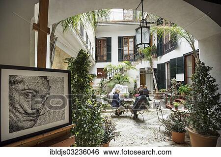 "Courtyard with a cafe, portrait of Salvador Dali at front, Dali Museum, Palma de Mallorca, Majorca, Balearic Islands, Spain, Europe" View Large Photo Image Stock Photograph - "Courtyard with a cafe, portrait of Salvador Dali at front, Dali Museum, Palma de Mallorca, Majorca, Balearic Islands, Spain, Europe". Fotosearch