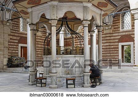 Stock Photo - "Courtyard with a Sadirvan, a fountain for ritual ablutions, Laleli Camii, Tulips Mosque, historic town centre, Laleli, Istanbul, European side, Istanbul Province, Turkey, European side, Europe". Fotosearch