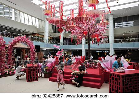 Stock Photo - "Courtyard with pink decorations, Marina Square, shopping centre in Marina Centre, Central Area, Central Business District, Singapore, Asia". Fotosearch
