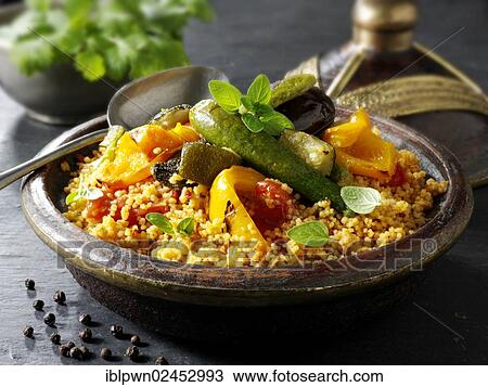 Couscous with Mediterranean roast vegetables View Large Photo Image Stock Image - Couscous with Mediterranean roast vegetables. Fotosearch