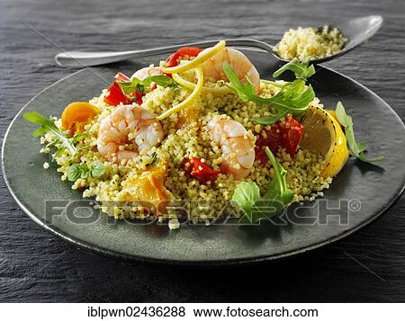 Couscous with tiger prawns View Large Photo Image Stock Photo - Couscous with tiger prawns. Fotosearch