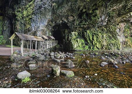 "Covered bridge leading into the partly flooded with water Smoo Cave limestone cave, Durness, Northern Highlands, Sutherland County, Highland, Scotland, United Kingdom, Europe" View Large Photo Image Picture - "Covered bridge leading into the partly flooded with water Smoo Cave limestone cave, Durness, Northern Highlands, Sutherland County, Highland, Scotland, United Kingdom, Europe". Fotosearch