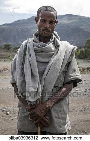 "Cowherd, blind man, nomad, Tigray, Ethiopia, Africa" View Large Photo Image Stock Image - "Cowherd, blind man, nomad, Tigray, Ethiopia, Africa". Fotosearch