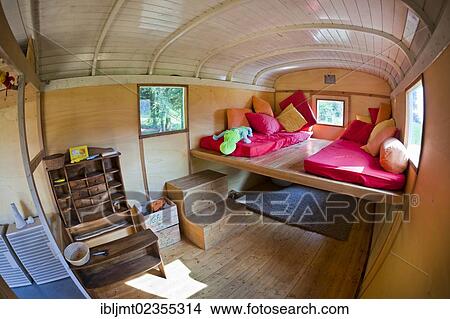 "Cozy corner and toy shop in the trailer which is used for playing and as a shelter in the forest kindergarten, Ilmmuenster, Bavaria, Germany, Europe" View Large Photo Image Picture - "Cozy corner and toy shop in the trailer which is used for playing and as a shelter in the forest kindergarten, Ilmmuenster, Bavaria, Germany, Europe". Fotosearch