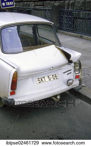 Stock Photo - "Cracked trunk lid of a white Trabant, parked in Leipzig, in April 1985, GDR, German Democratic Republic, Europe". Fotosearch