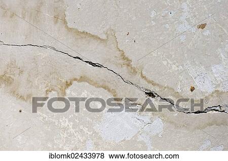 "Cracked wall, traces of moisture, renovation of an old building, Stuttgart, Baden-Wuerttemberg, Germany, Europe" View Large Photo Image Stock Photo - "Cracked wall, traces of moisture, renovation of an old building, Stuttgart, Baden-Wuerttemberg, Germany, Europe". Fotosearch