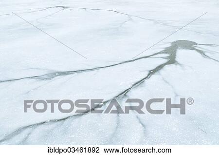 "Cracks spread across the surface of a frozen lake in Danube Park, Vienna, Vienna State, Austria, Europe" View Large Photo Image Stock Image - "Cracks spread across the surface of a frozen lake in Danube Park, Vienna, Vienna State, Austria, Europe". Fotosearch