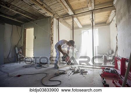 Craftsman during the substantial refurbishment of a building View Large Photo Image Stock Image - Craftsman during the substantial refurbishment of a building. Fotosearch