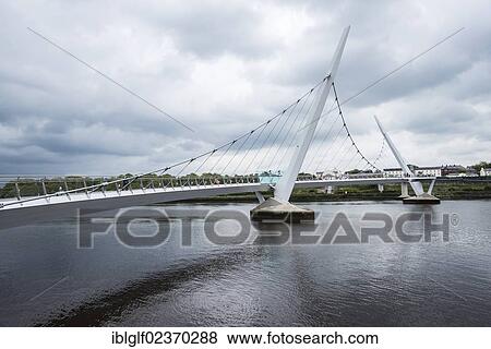 Stock Photo - "Craigavon Bridge, a bridge of peace over the River Foyle, County Londonderry, Northern Ireland, United Kingdom, Europe". Fotosearch