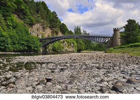 Stock Image - "Craigellachie Bridge over the River Spey, built by Thomas Telford, Speyside, Aberlour, Moray, Highlands, Scotland, United Kingdom, Europe". Fotosearch