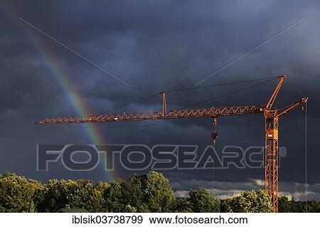 "Crane in front of a rainbow, Biberach an der Riss, Upper Swabia, Baden-Wurttemberg, Germany, Europe" View Large Photo Image Stock Photo - "Crane in front of a rainbow, Biberach an der Riss, Upper Swabia, Baden-Wurttemberg, Germany, Europe". Fotosearch