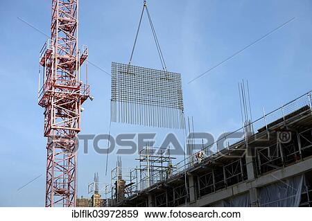 "Crane lifting construction steel, Digicel Towers building site, Port-au-Prince, Haiti, North America" View Large Photo Image Stock Photo - "Crane lifting construction steel, Digicel Towers building site, Port-au-Prince, Haiti, North America". Fotosearch