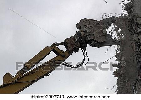 "Crane Nibbler demolishing a building, Hamburg, Germany, Europe" View Large Photo Image Stock Photo - "Crane Nibbler demolishing a building, Hamburg, Germany, Europe". Fotosearch