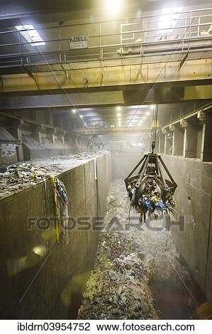 "Crane transporting waste to the incinerators at a waste incineration plant, Essen-Karnap, North Rhine-Westphalia, Germany, Europe" View Large Photo Image Stock Image - "Crane transporting waste to the incinerators at a waste incineration plant, Essen-Karnap, North Rhine-Westphalia, Germany, Europe". Fotosearch