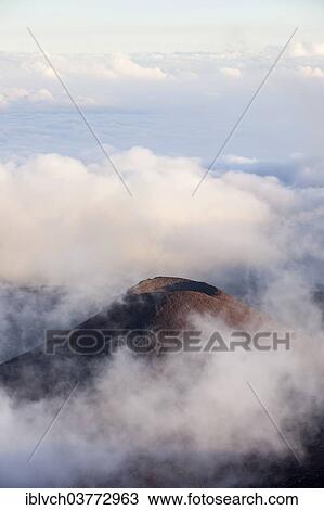 "Crater in the fog, below the Mauna Kea volcano, Big Island, Hawaii, United States, North America" View Large Photo Image Stock Image - "Crater in the fog, below the Mauna Kea volcano, Big Island, Hawaii, United States, North America". Fotosearch