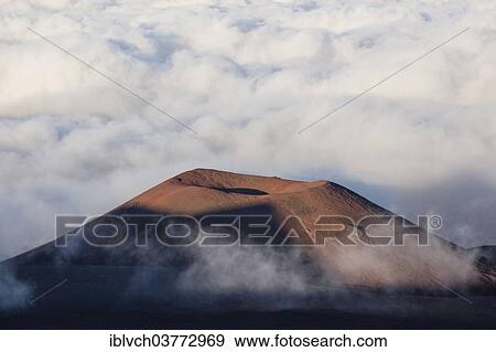 "Crater in the fog, below the Mauna Kea volcano, Big Island, Hawaii, United States, North America" View Large Photo Image Stock Photo - "Crater in the fog, below the Mauna Kea volcano, Big Island, Hawaii, United States, North America". Fotosearch
