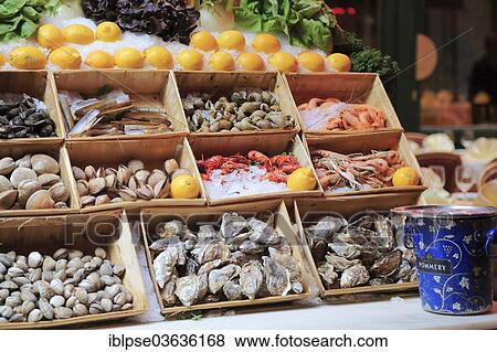 "Crates of oysters, mussels and shrimp in front of a restaurant, Brussels, Brussels Region, Belgium, Europe" View Large Photo Image Stock Photo - "Crates of oysters, mussels and shrimp in front of a restaurant, Brussels, Brussels Region, Belgium, Europe". Fotosearch