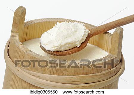 Cream on a wooden spoon in a traditional wooden pail View Large Photo Image Stock Image - Cream on a wooden spoon in a traditional wooden pail. Fotosearch