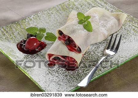 "Crepe filled with Roter Grutze, a red fruit jelly" View Large Photo Image Stock Photo - "Crepe filled with Roter Grutze, a red fruit jelly". Fotosearch