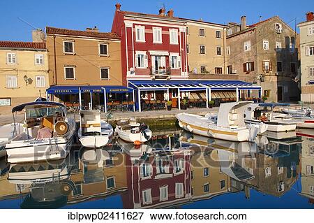 Cres old town harbour with small local fishing boats, Cres Island, Croatia, Europe View Large Photo Image Stock Photo - Cres old town harbour with small local fishing boats, Cres Island, Croatia, Europe. Fotosearch