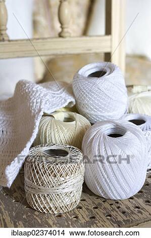 "Crochet thread on an old cream-coloured chair, shabby chic" View Large Photo Image Picture - "Crochet thread on an old cream-coloured chair, shabby chic". Fotosearch