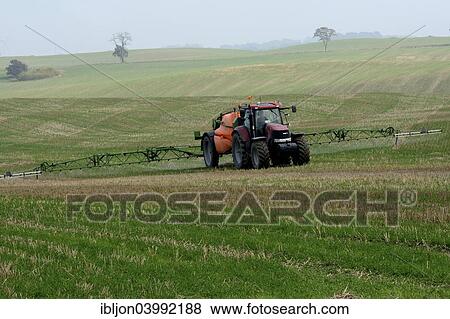 "Crop-spraying on farming field, Ystad, Scania, Sweden, Europe" View Large Photo Image Stock Photo - "Crop-spraying on farming field, Ystad, Scania, Sweden, Europe". Fotosearch