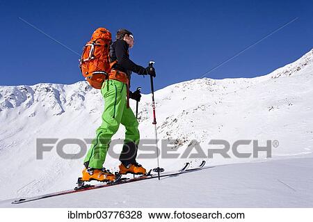 "Cross-country skier ascending Schongrubspitze Mountain, Alto Adige, Italy, Europe" View Large Photo Image Stock Photo - "Cross-country skier ascending Schongrubspitze Mountain, Alto Adige, Italy, Europe". Fotosearch
