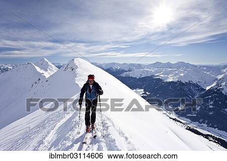 "Cross-country skier ascending Ellesspitze Mountain, here on the summit ridge with Ridnauntal Valley below, oberhalb von Innerpflersch, Pflerschtal, South Tyrol province, Trentino-Alto Adige, Italy, Europe" View Large Photo Image Stock Photograph - "Cross-country skier ascending Ellesspitze Mountain, here on the summit ridge with Ridnauntal Valley below, oberhalb von Innerpflersch, Pflerschtal, South Tyrol province, Trentino-Alto Adige, Italy, Europe". Fotosearch