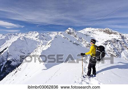 "Cross-country skier on the summit of Ellesspitze Mountain in Pflerschtal valley, Hocheck Mountain at the rear, Alpen, Europa, South Tyrol province, Trentino-Alto Adige, Italy, Europe" View Large Photo Image Stock Photograph - "Cross-country skier on the summit of Ellesspitze Mountain in Pflerschtal valley, Hocheck Mountain at the rear, Alpen, Europa, South Tyrol province, Trentino-Alto Adige, Italy, Europe". Fotosearch