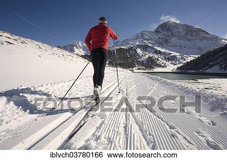 "Cross-country skier, right the Laengental Reservoir, Kuehtai, Sellrain Valley, Tyrol, Austria, Europe" View Large Photo Image Stock Photograph - "Cross-country skier, right the Laengental Reservoir, Kuehtai, Sellrain Valley, Tyrol, Austria, Europe". Fotosearch