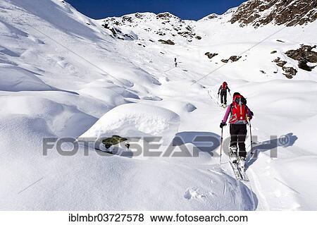 "Cross country skiers ascending Wurzer Alpenspitz Mountain in the Ridnauntal Valley above Entholz, South Tyrol province, Trentino-Alto Adige, Italy, Europe" View Large Photo Image Stock Photo - "Cross country skiers ascending Wurzer Alpenspitz Mountain in the Ridnauntal Valley above Entholz, South Tyrol province, Trentino-Alto Adige, Italy, Europe". Fotosearch