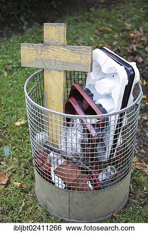 "Cross in a trash can at Melatenfriedhof cemetery, Cologne, North Rhine-Westphalia, Germany, Europe" View Large Photo Image Stock Photograph - "Cross in a trash can at Melatenfriedhof cemetery, Cologne, North Rhine-Westphalia, Germany, Europe". Fotosearch