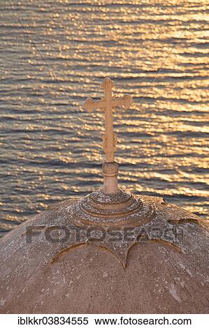 Stock Photography - "Cross on a church dome at sunset, Thira, Santorini, Cyclades, Greece, Europe". Fotosearch