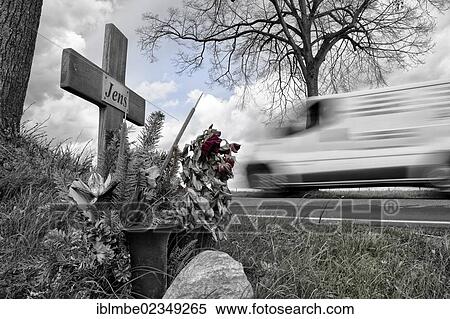 "Cross on the roadside, a car passing at the back, near Werder, Brandenburg, Germany, Europe" View Large Photo Image Stock Photography - "Cross on the roadside, a car passing at the back, near Werder, Brandenburg, Germany, Europe". Fotosearch