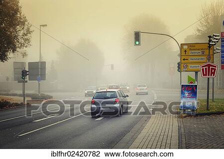 Crossroads with traffic lights on a foggy morning, Grevenbroich, North Rhine-Westphalia, Germany, Europe View Large Photo Image Stock Image - Crossroads with traffic lights on a foggy morning, Grevenbroich, North Rhine-Westphalia, Germany, Europe. Fotosearch