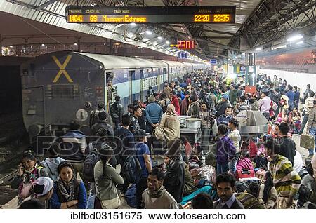 "Crowded platform at New Delhi Railway Station, New Delhi, Delhi, India, Asia" View Large Photo Image Stock Photography - "Crowded platform at New Delhi Railway Station, New Delhi, Delhi, India, Asia". Fotosearch