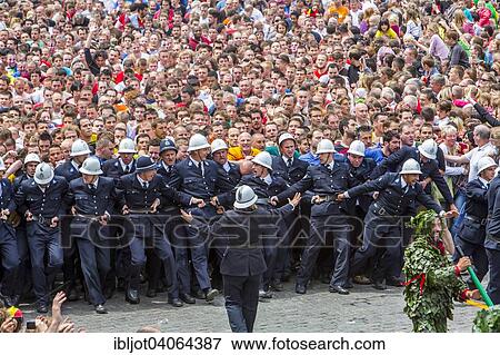 "Crowds are cordoned off, LUMECON, the battle of St. George with the dragon, highlight of the city festival Doudou, Grand Place, Mons, Hainaut, Wallonia, Belgium, parade of actors, Europe" View Large Photo Image Stock Photo - "Crowds are cordoned off, LUMECON, the battle of St. George with the dragon, highlight of the city festival Doudou, Grand Place, Mons, Hainaut, Wallonia, Belgium, parade of actors, Europe". Fotosearch