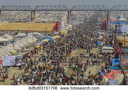 Stock Photograph - "Crowds of people arriving at Kumbha Mela grounds, Allahabad, Uttar Pradesh, India, Asia". Fotosearch