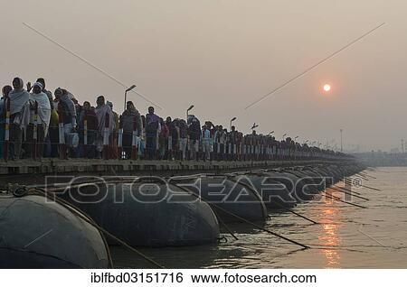 "Crowds of people arriving at Kumbha Mela grounds, walking on pontoon bridges, Allahabad, Uttar Pradesh, India, Asia" View Large Photo Image Stock Photograph - "Crowds of people arriving at Kumbha Mela grounds, walking on pontoon bridges, Allahabad, Uttar Pradesh, India, Asia". Fotosearch