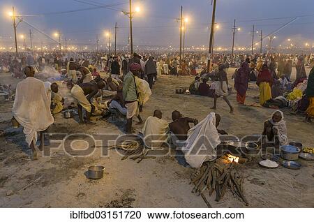 Stock Image - "Crowds of people gathering at Kumbha Mela grounds, Allahabad, Uttar Pradesh, India, Asia". Fotosearch