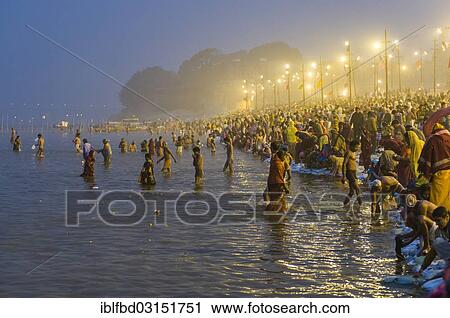 "Crowds of people gathering on the Sangam, the confluence of the rivers Ganges, Yamuna and Saraswati, for the holy bath in the morning, Kumbha Mela mass Hindu pilgrimage, Allahabad, Uttar Pradesh, India, Asia" View Large Photo Image Stock Image - "Crowds of people gathering on the Sangam, the confluence of the rivers Ganges, Yamuna and Saraswati, for the holy bath in the morning, Kumbha Mela mass Hindu pilgrimage, Allahabad, Uttar Pradesh, India, Asia". Fotosearch