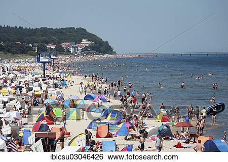 "Crowds of people on the beach of the Baltic Sea, Heringsdorf, Mecklenburg-Western Pomerania, Germany, Europe" View Large Photo Image Stock Photograph - "Crowds of people on the beach of the Baltic Sea, Heringsdorf, Mecklenburg-Western Pomerania, Germany, Europe". Fotosearch