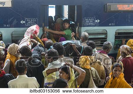 "Crowds of people pushing inside a train, on a platform of the railway station, Allahabad, Uttar Pradesh, India, Asia" View Large Photo Image Stock Photograph - "Crowds of people pushing inside a train, on a platform of the railway station, Allahabad, Uttar Pradesh, India, Asia". Fotosearch