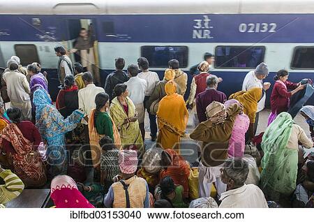 "Crowds of people waiting for delayed trains on a platform of the railway station, Allahabad, Uttar Pradesh, India, Asia" View Large Photo Image Stock Image - "Crowds of people waiting for delayed trains on a platform of the railway station, Allahabad, Uttar Pradesh, India, Asia". Fotosearch
